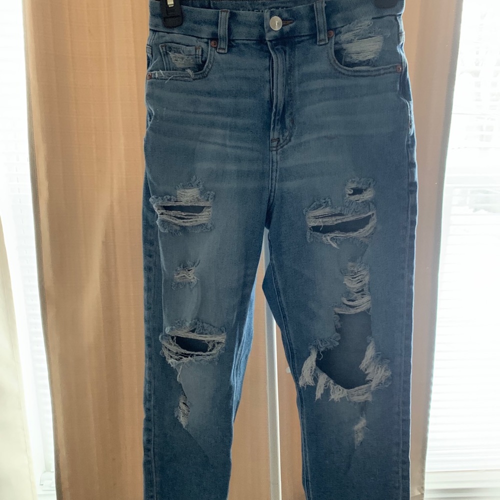 Light blue distressed jeans
